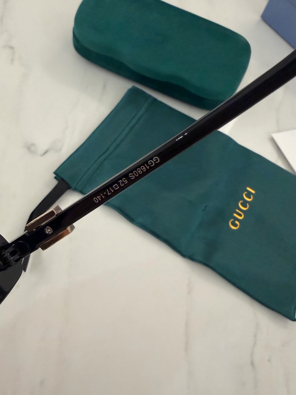 Gucci Black Oval Women's Sunglasses with Dark Lenses - Picture 12 of 13